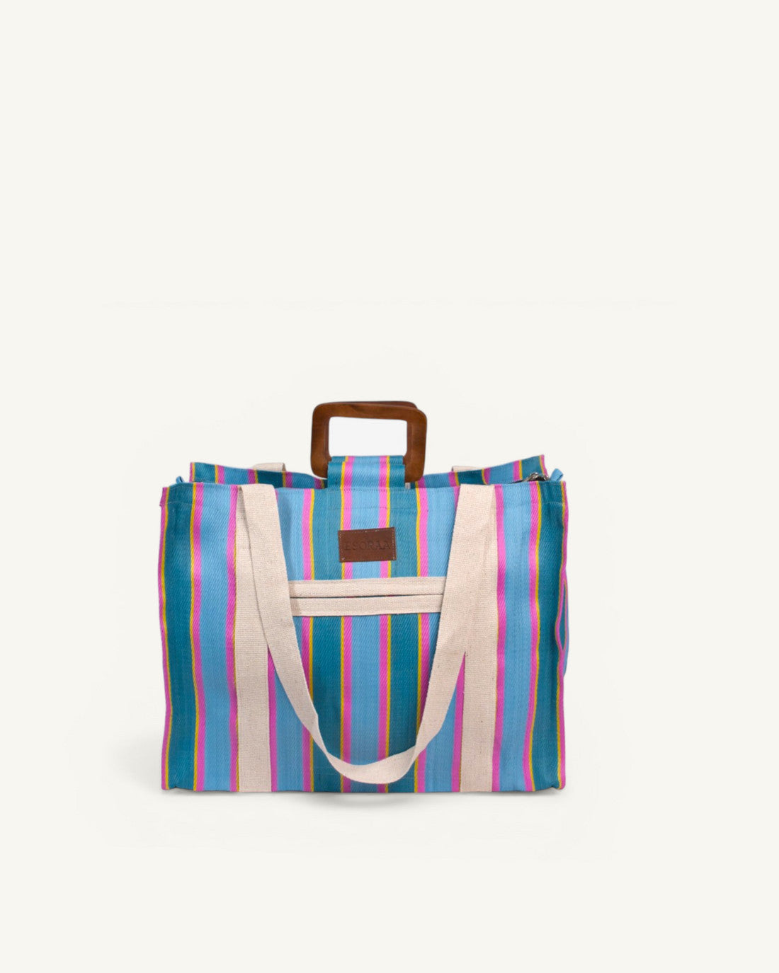 Front view of the Block Azure oversized square bag in two shades of blue recycled nylon with wooden handles and organic cotton shoulder straps.