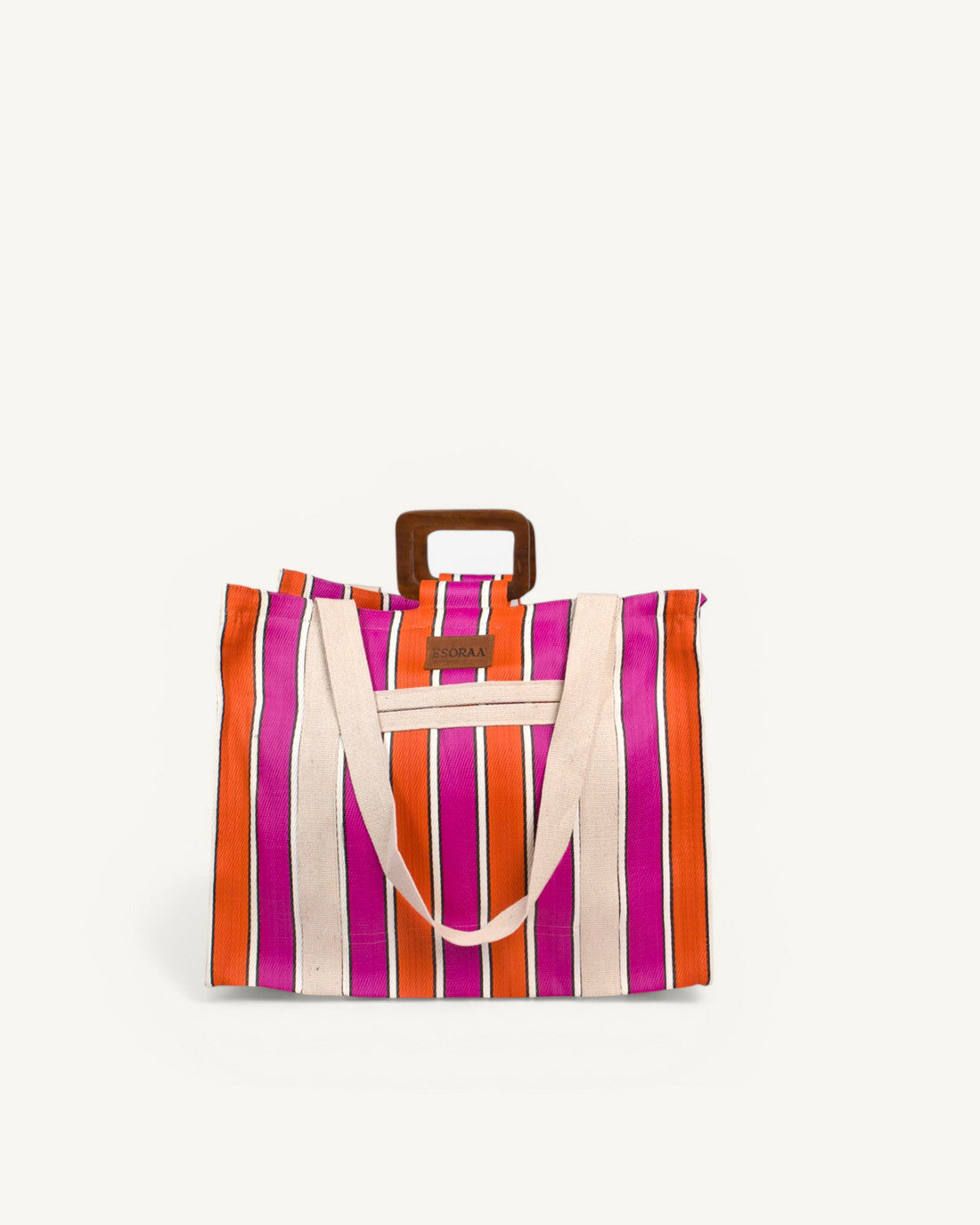 Front view of the Block Sorbet oversized square bag in orange and pink recycled nylon with wooden handles and organic cotton shoulder straps.