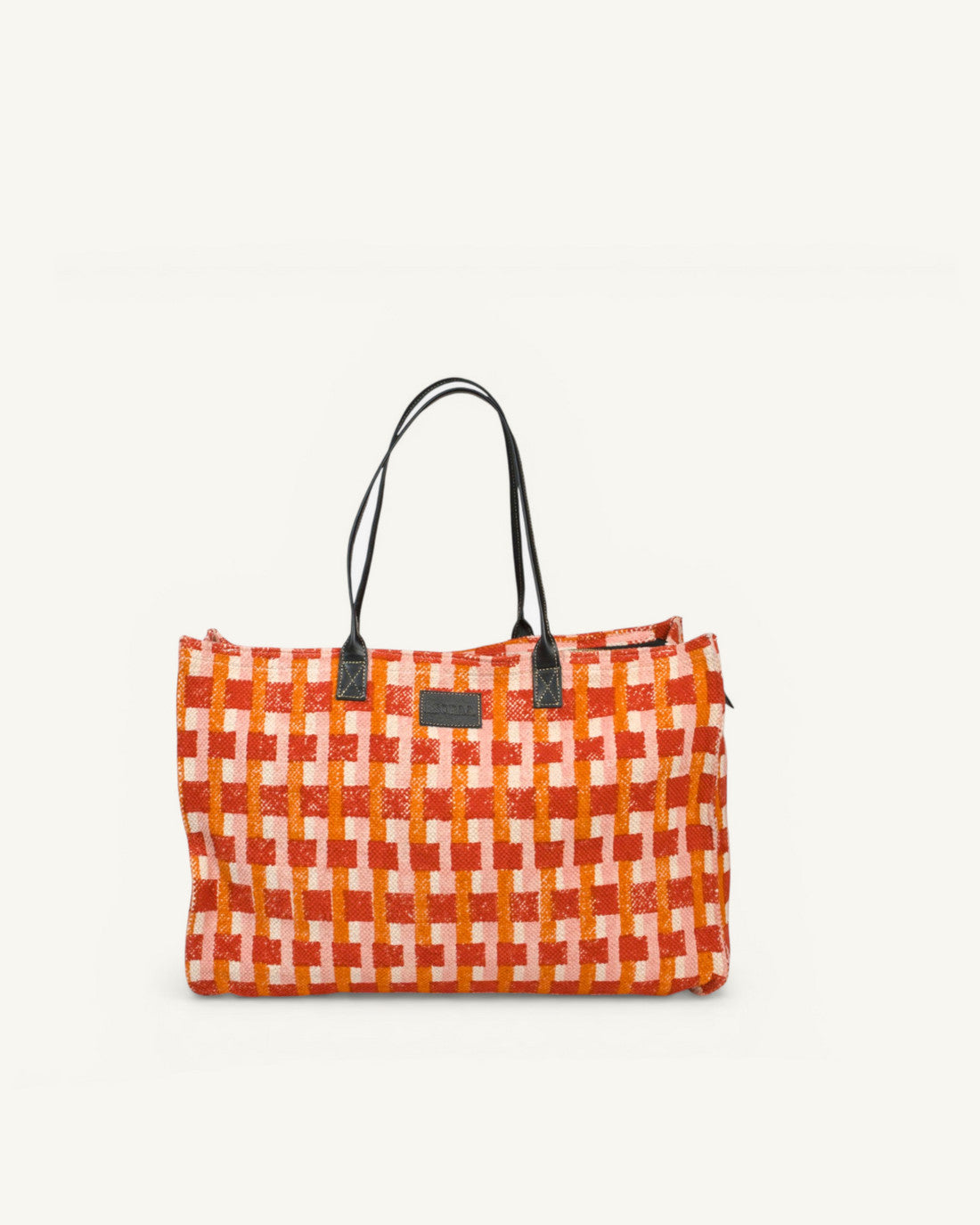 Esoraa Market Zip tote bag featuring a Campari red and orange block-printed checkered pattern with a leather shoulder strap.