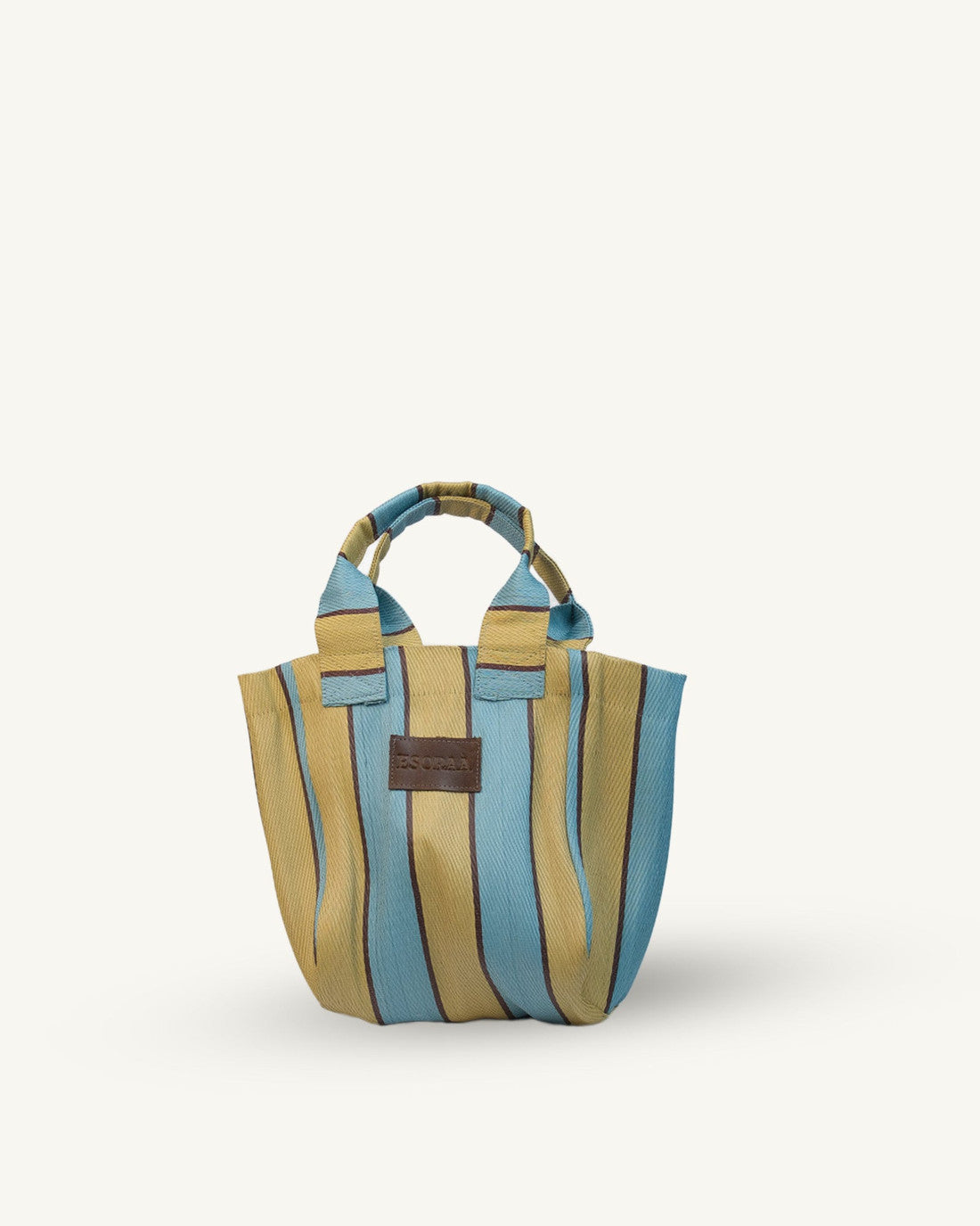 Striped handbag with a brown label on a white background