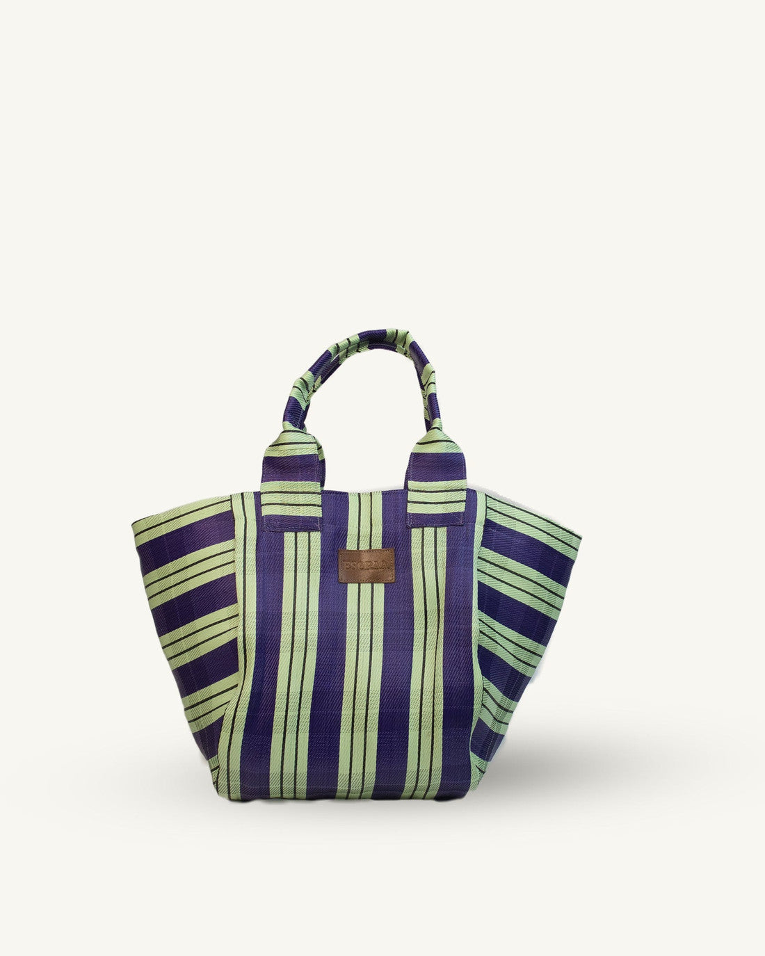 Striped tote bag with purple and green pattern on a white background