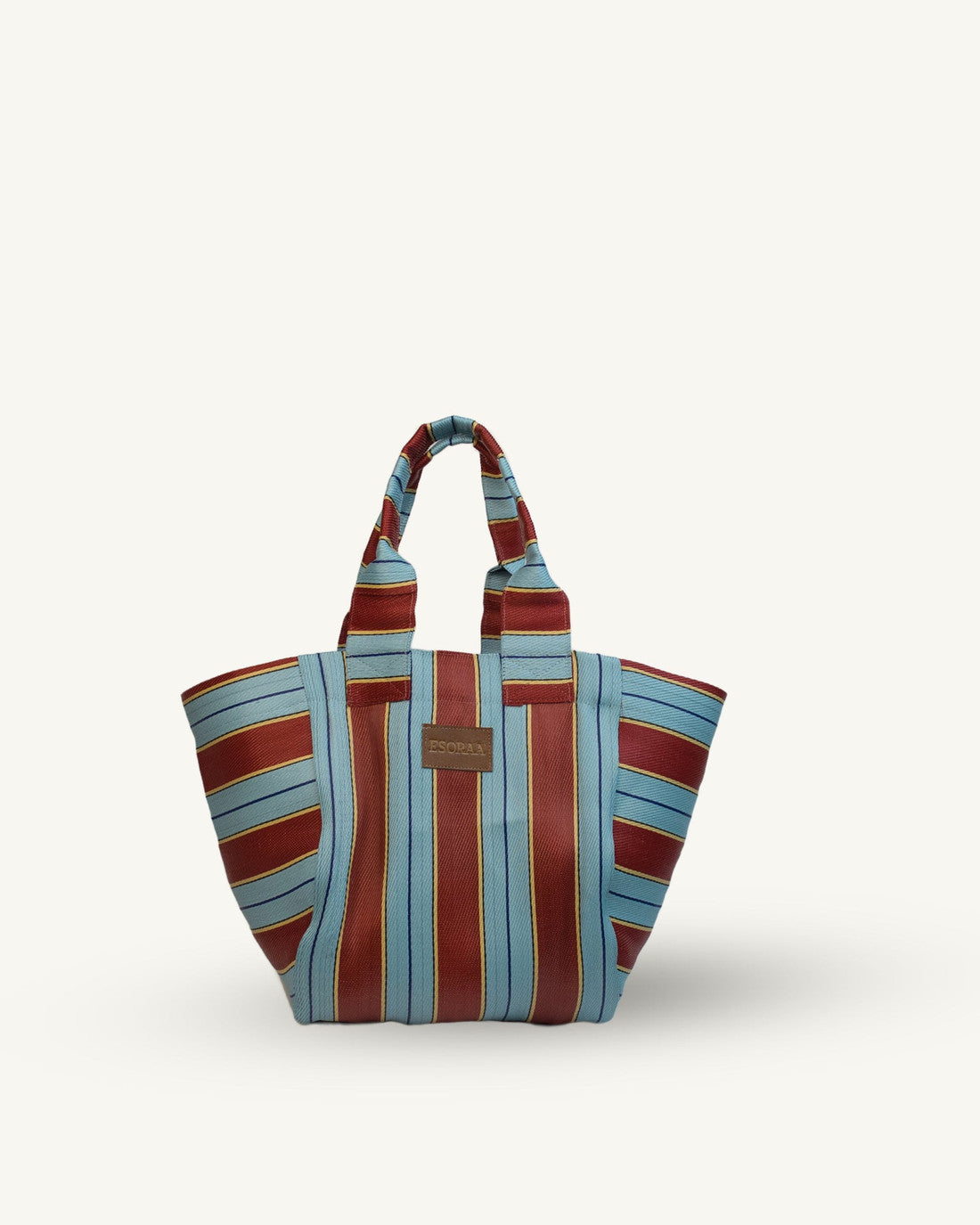 Striped tote bag with a visible brand logo on a white background