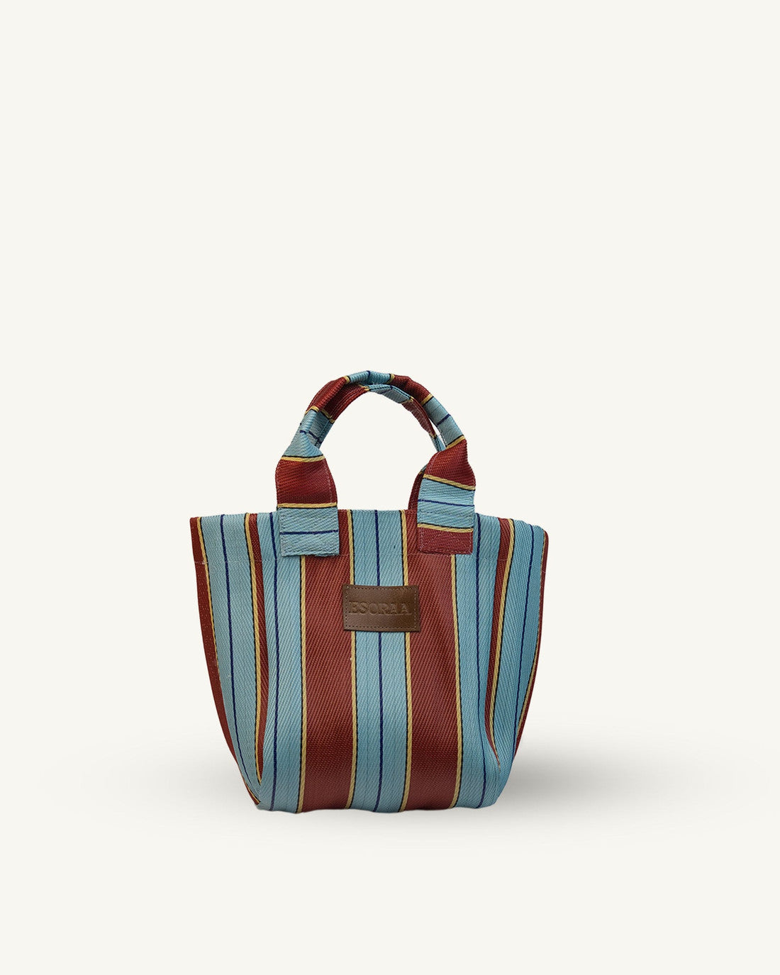 Striped handbag with red and blue pattern on a white background