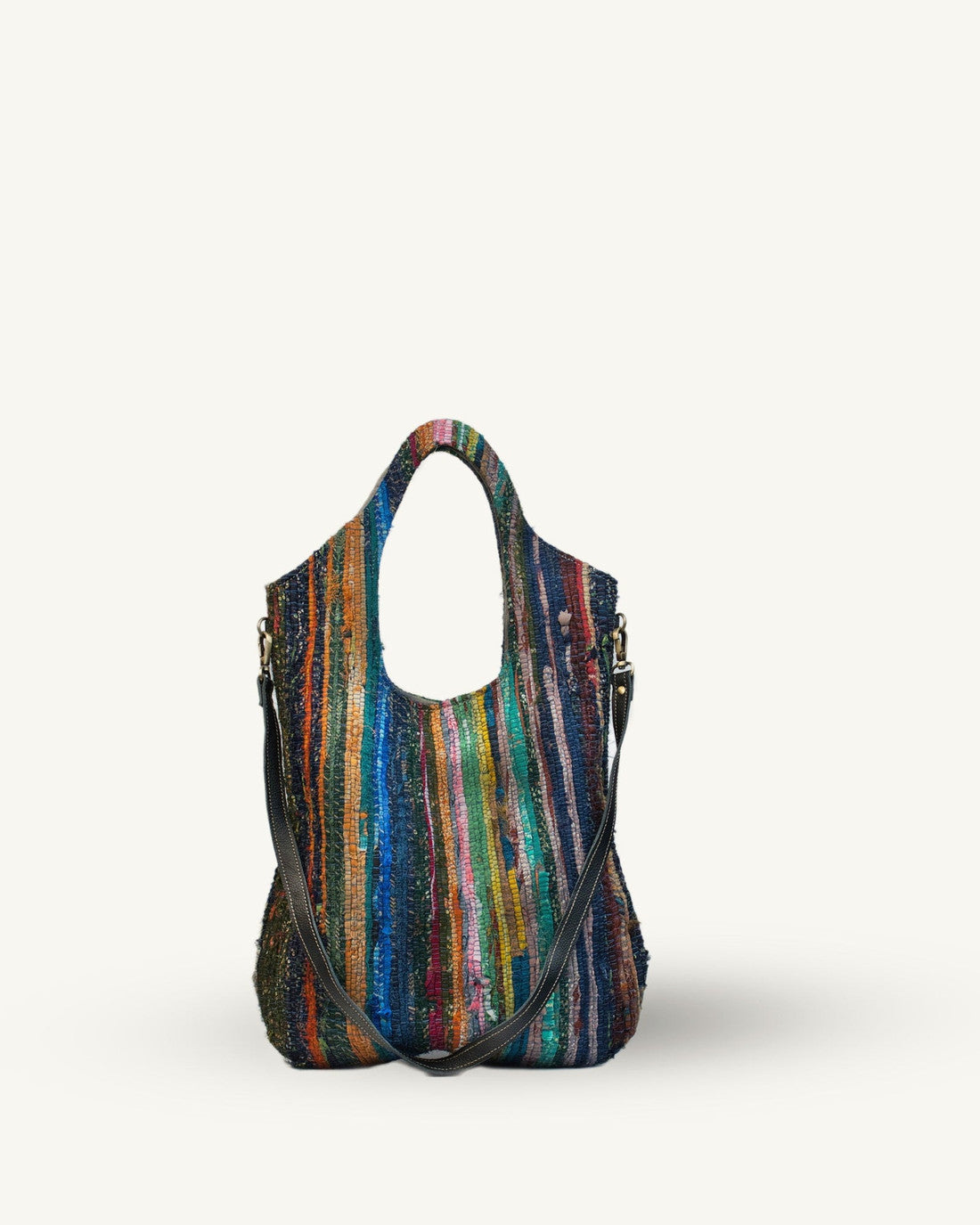 Multicolored striped handbag on a white background