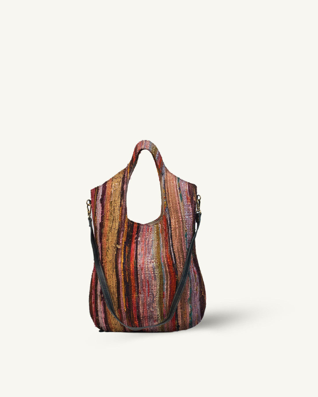 Multicolored striped handbag on a white background