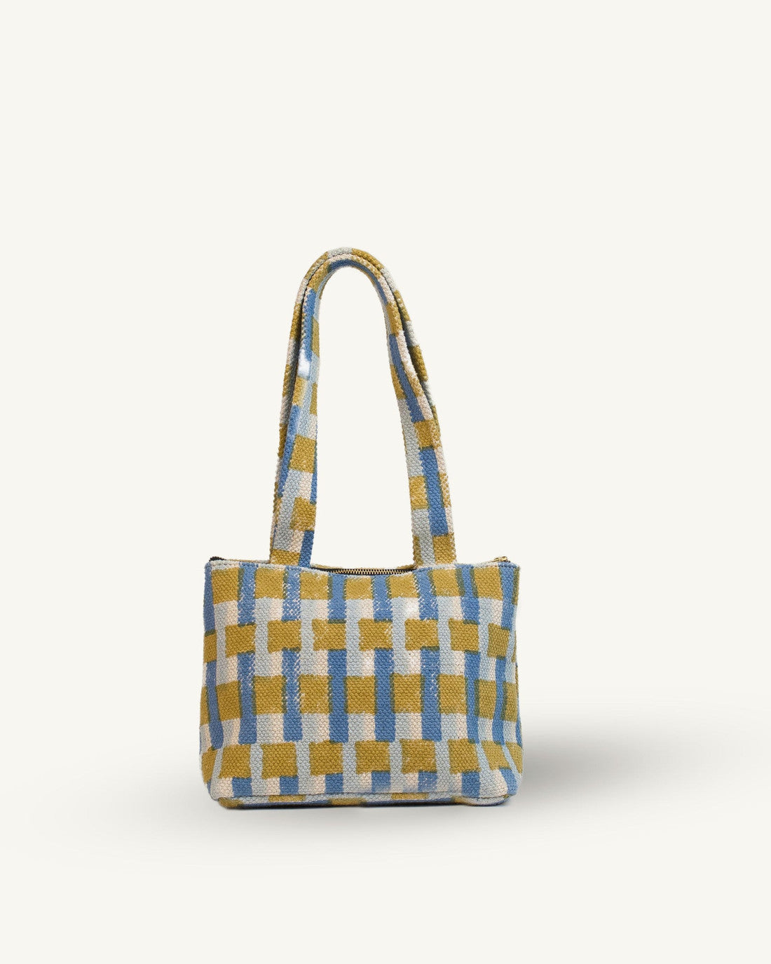 Checkered handbag with yellow and blue pattern on a white background