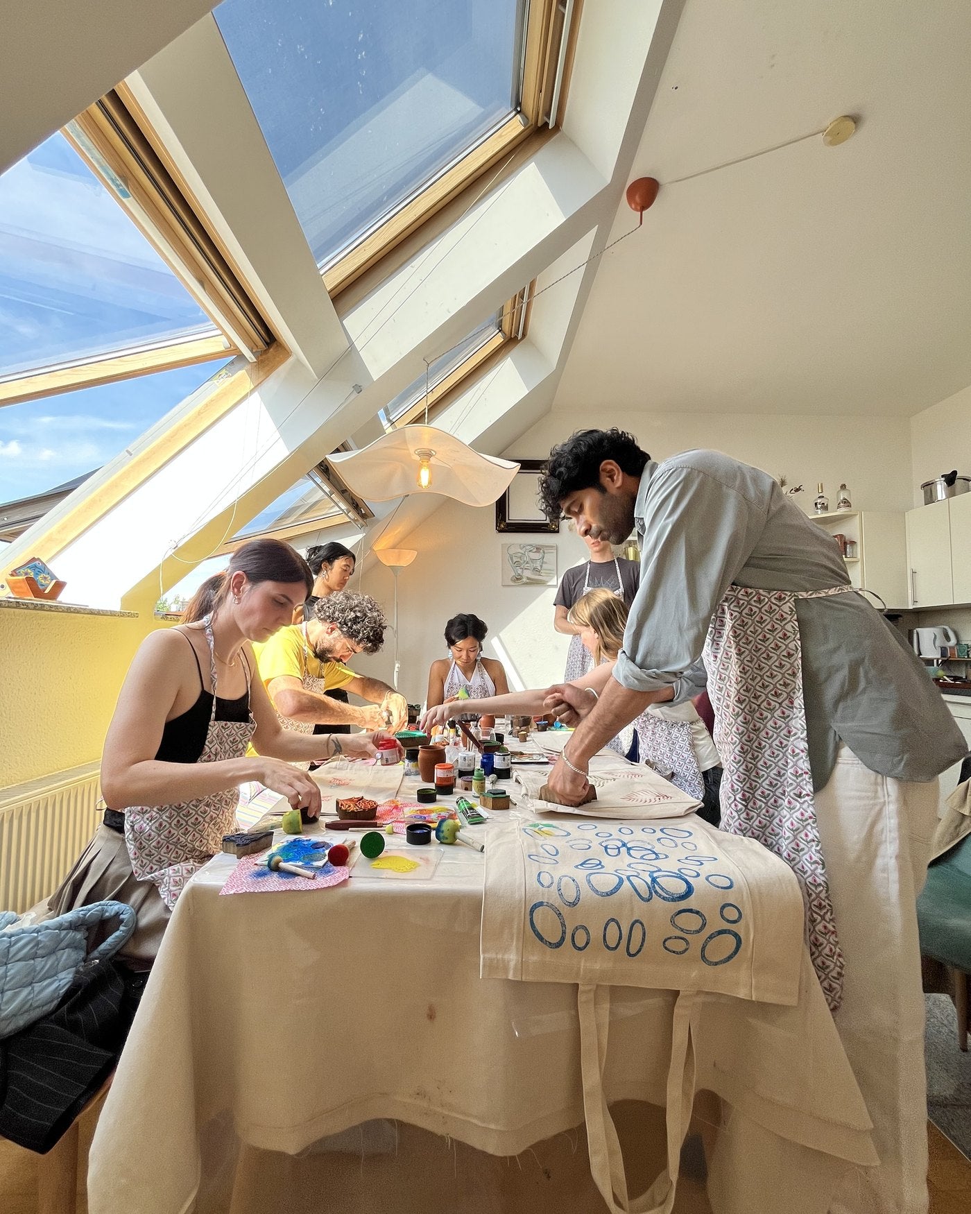 A group of friends printing together at the Esoraa studio