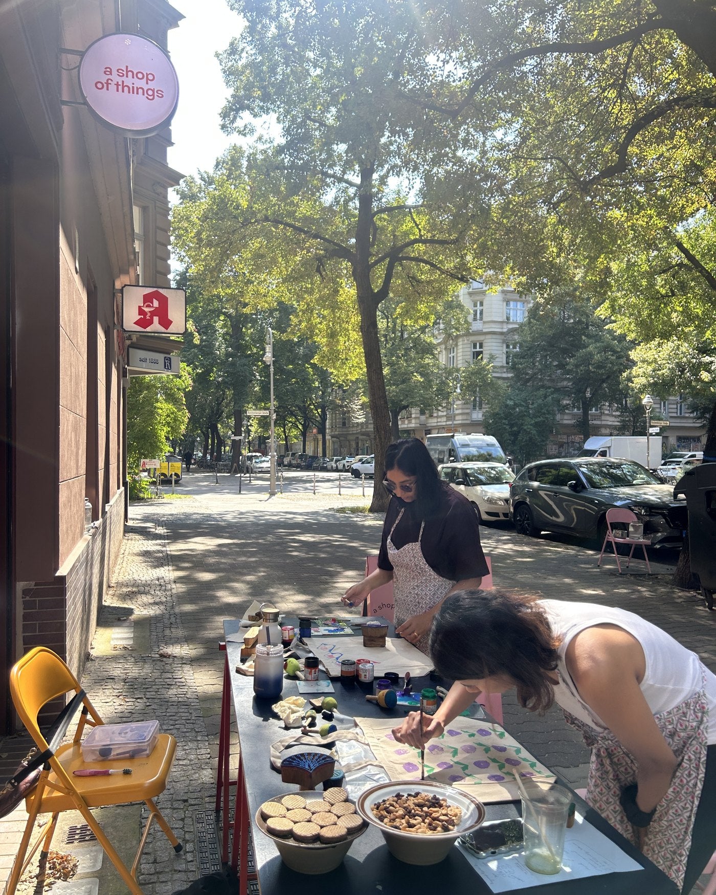 A group printing outside on a summer afternoon