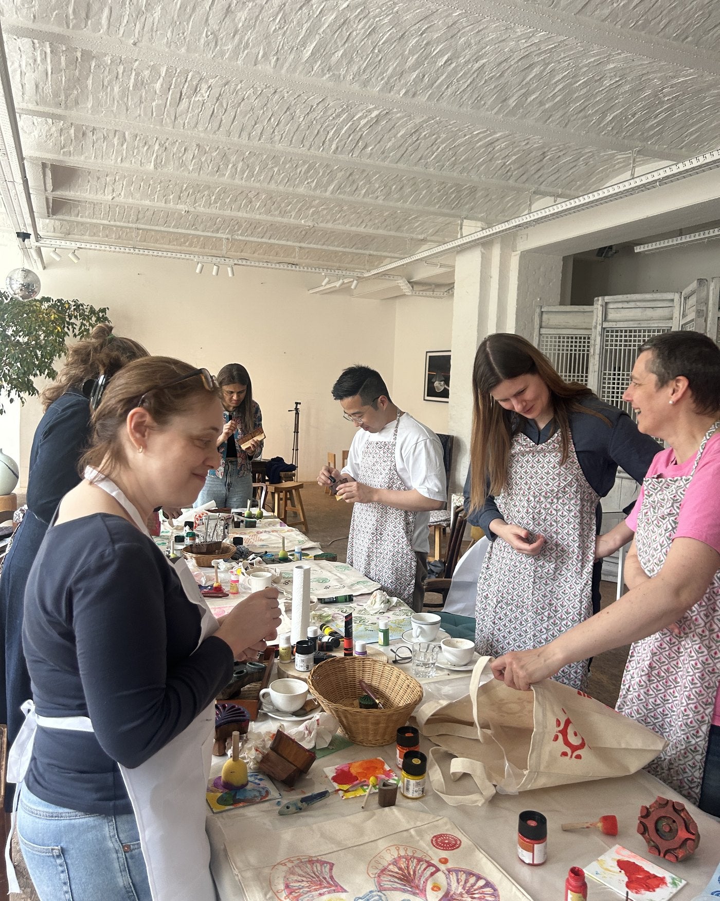 A group printing together at the Esoraa studio