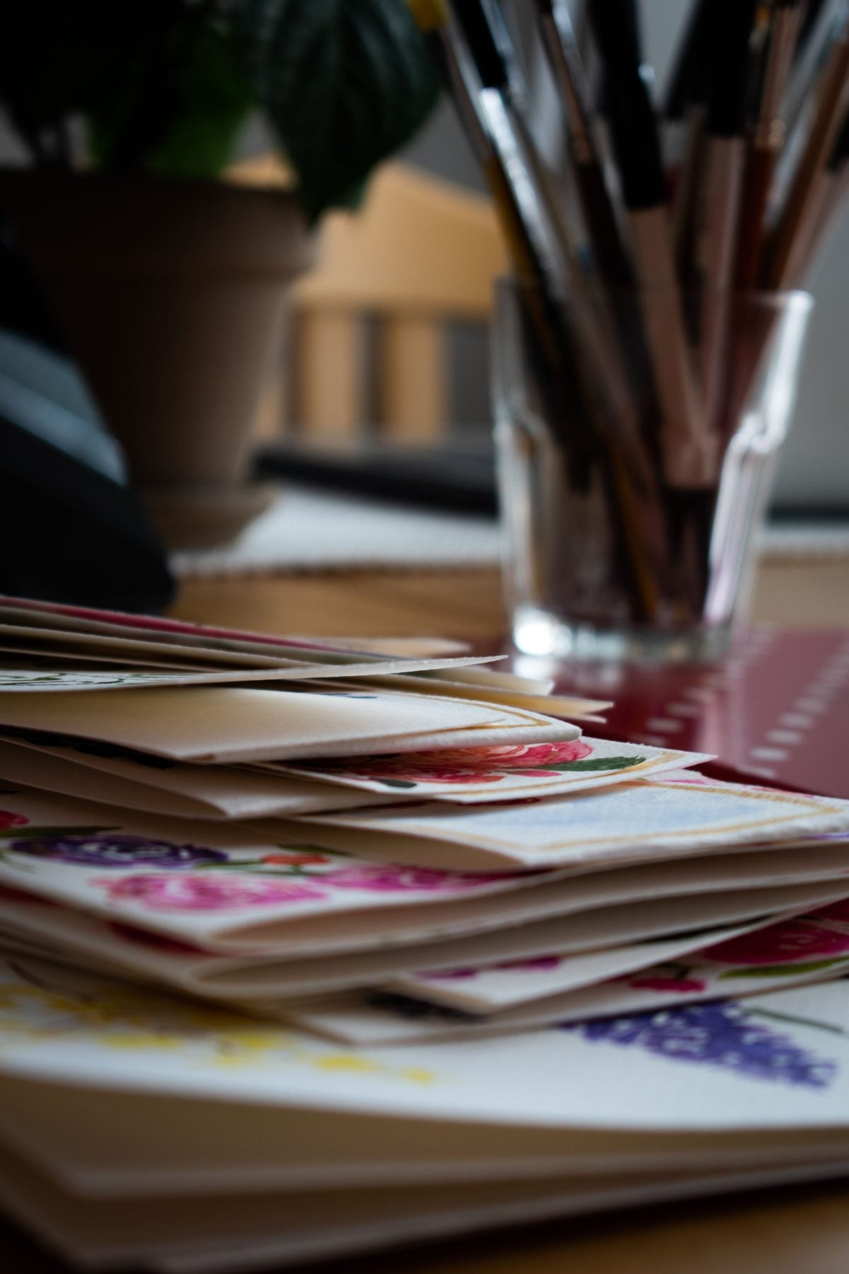 A stack of hand printed cards