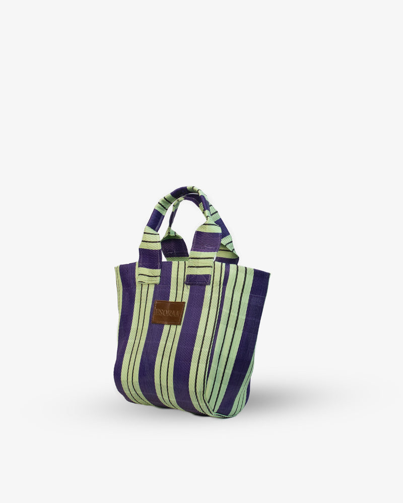 Striped tote bag with a brown patch on a white background