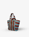 Striped tote bag with brown and blue pattern on a white background