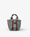 Striped handbag with red and blue pattern on a white background
