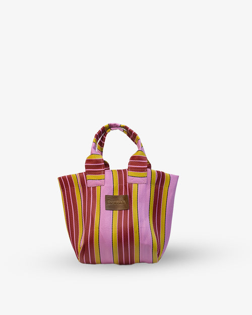 Pink Striped handbag with a brown label on a white background