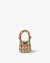 Small checkered bag with a green and brown pattern on a white background