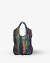 Multicolored striped handbag on a white background