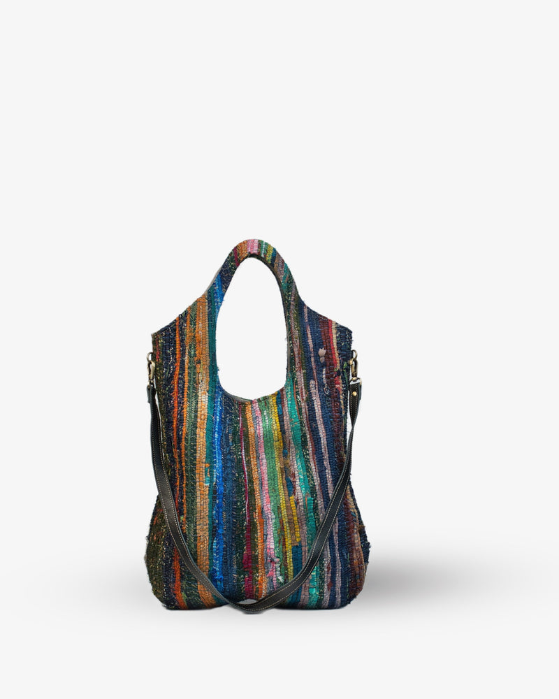 Multicolored striped handbag on a white background