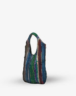 Multicolored striped bag on a white background