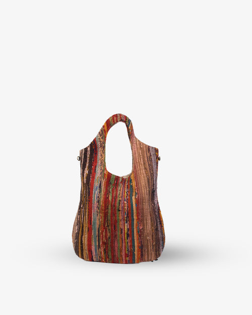 Multicolored striped bag on a white background