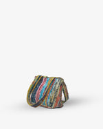 Multicolored woven bag on a white background