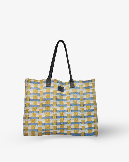 Tote bag with a checkered pattern on a white background